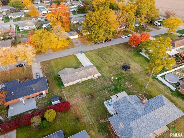 a picture of a book and a bed