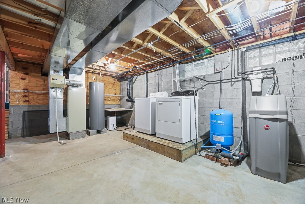 2642 Blake Road Wadsworth, OH 44281 - Photo 35 of 46 Utility room featuring a concrete floor, exposed ceiling joists, and block wall construction