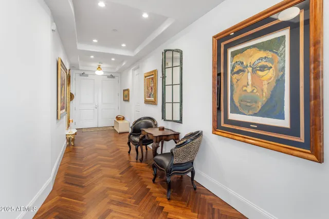 a view of a livingroom with furniture and a window