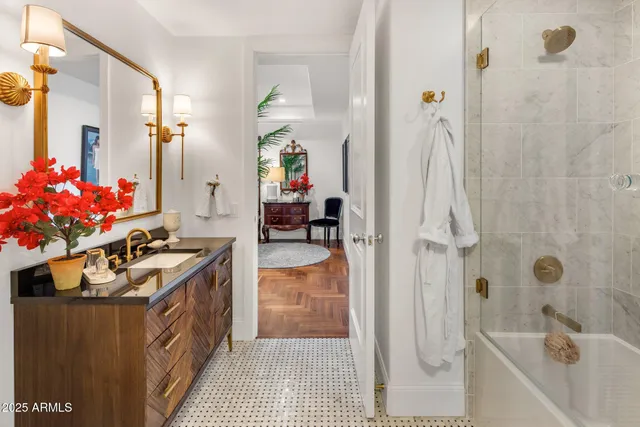 a kitchen with a sink stove and a refrigerator