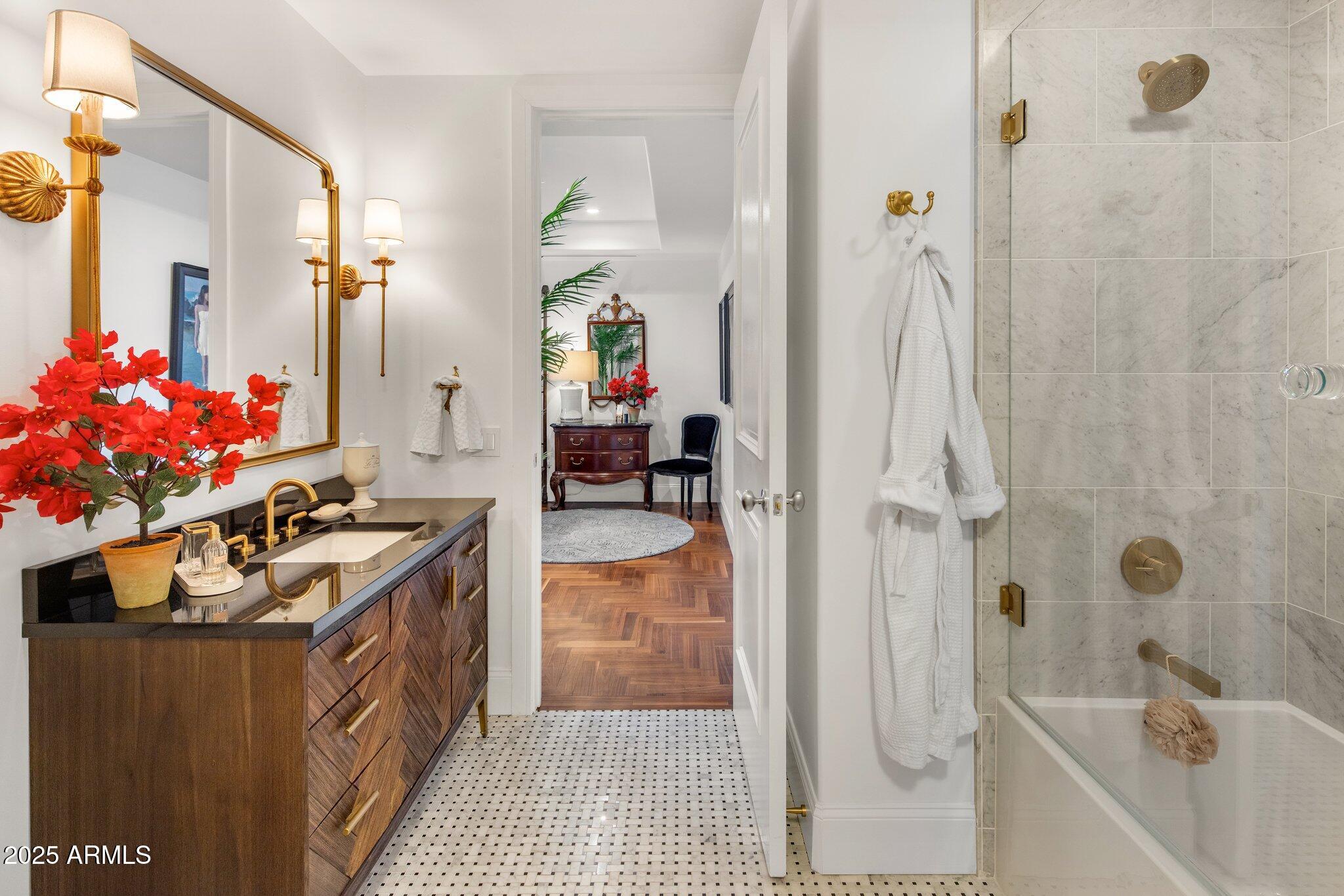 2211 East Camelback Road, Unit 902 Phoenix, AZ 85016 - Photo 29 of 37 a kitchen with a sink stove and a refrigerator