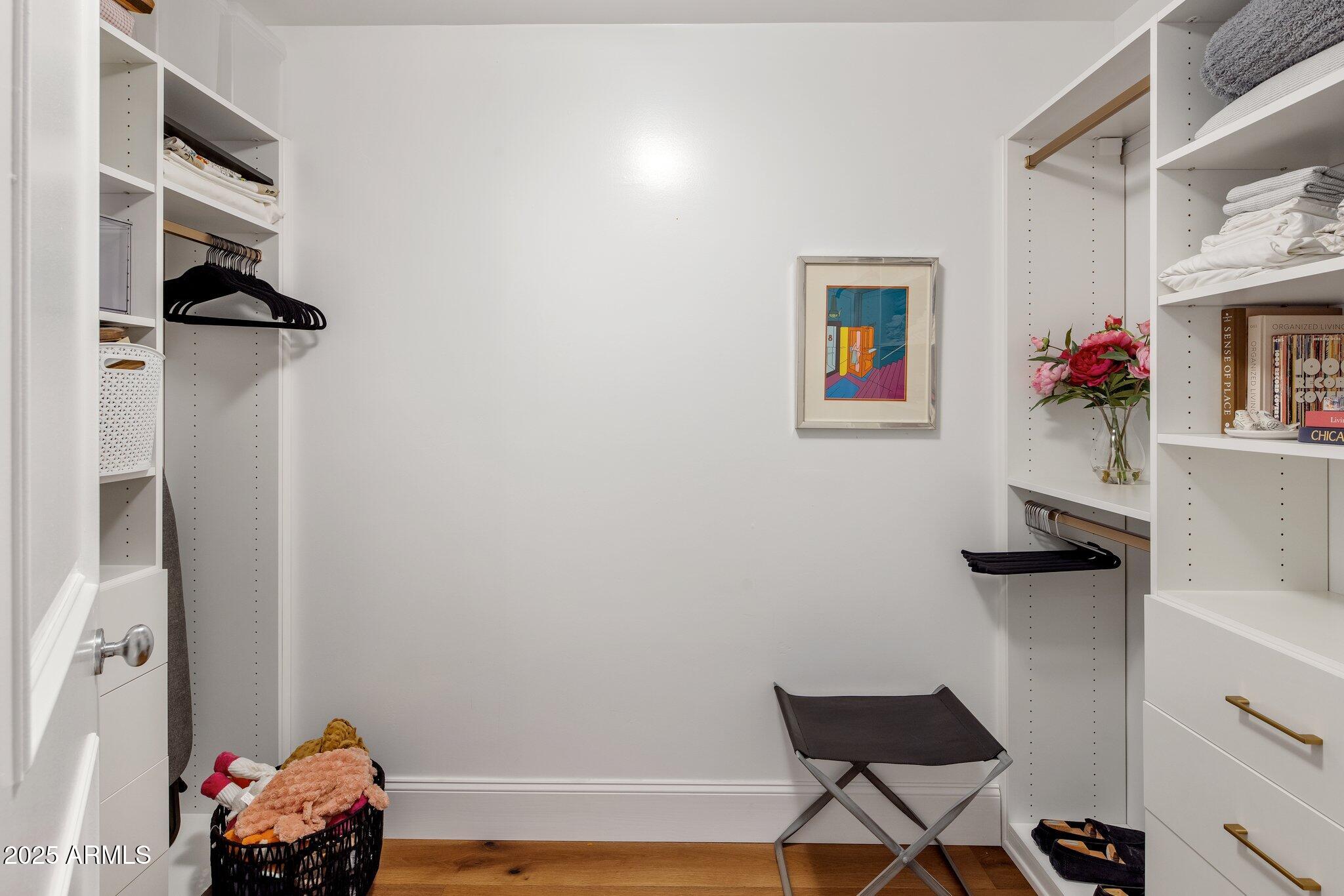 2211 East Camelback Road, Unit 902 Phoenix, AZ 85016 - Photo 30 of 37 a living room with furniture and a window