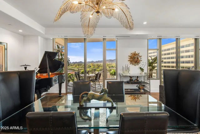 a view of a living room and dining room