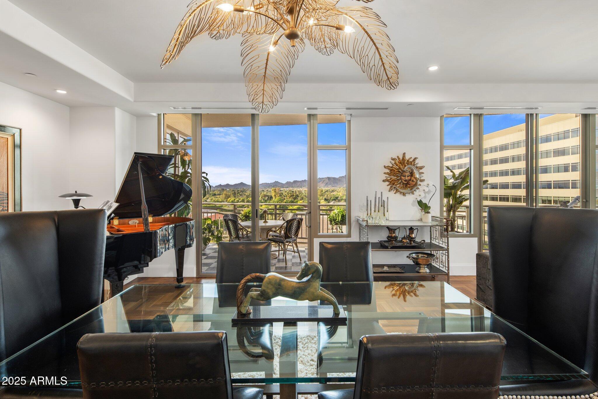 2211 East Camelback Road, Unit 902 Phoenix, AZ 85016 - Photo 5 of 37 a view of a living room and dining room