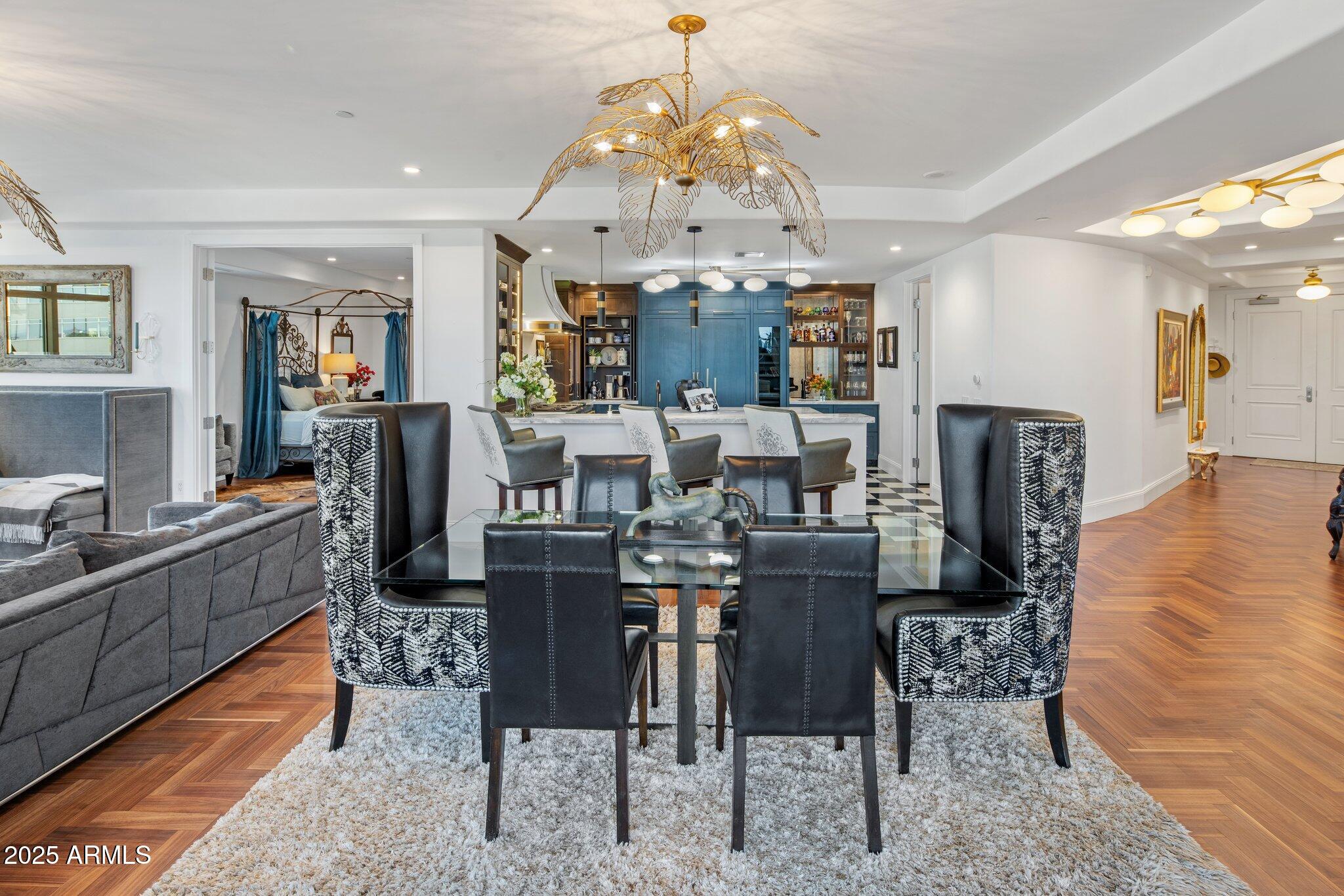 2211 East Camelback Road, Unit 902 Phoenix, AZ 85016 - Photo 6 of 37 a view of a dining room with furniture