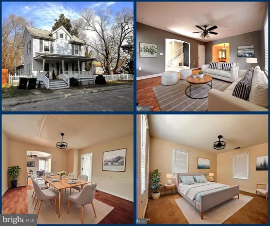 a view of a white house with large windows and a large tree