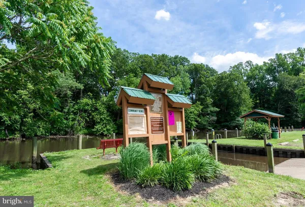 a view of a deck with a yard