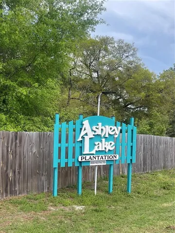 a view of a house with a big yard