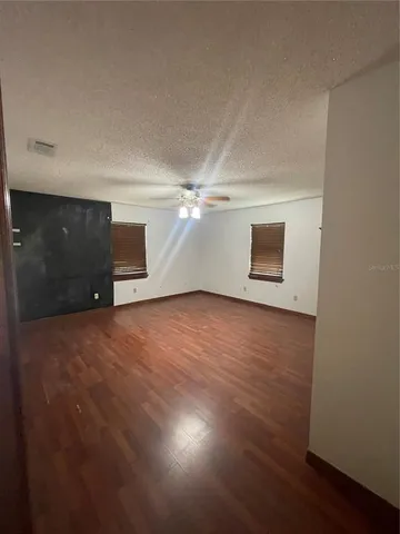 a kitchen with a sink stove and refrigerator