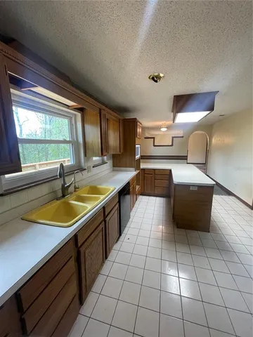 a view of a closet area with living room