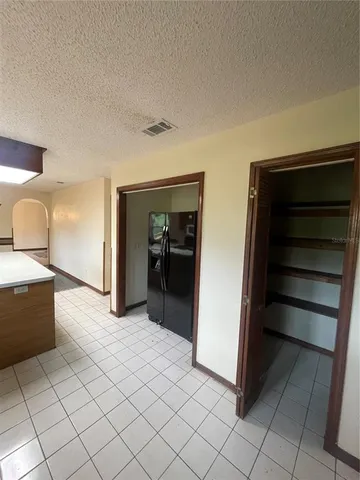 a view of a room with window and stairs
