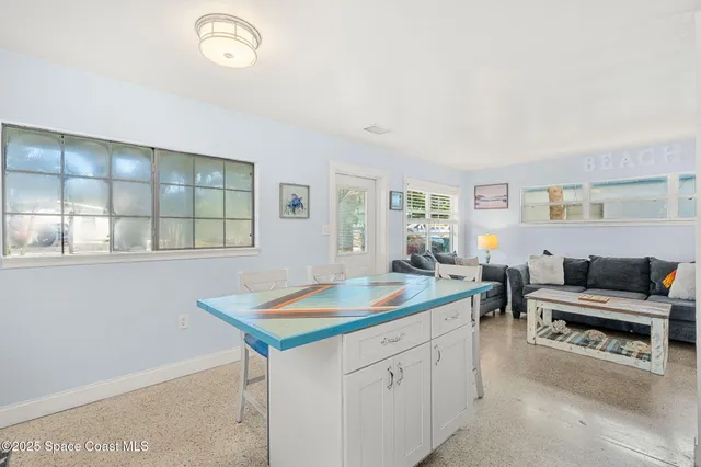 a room with furniture and window