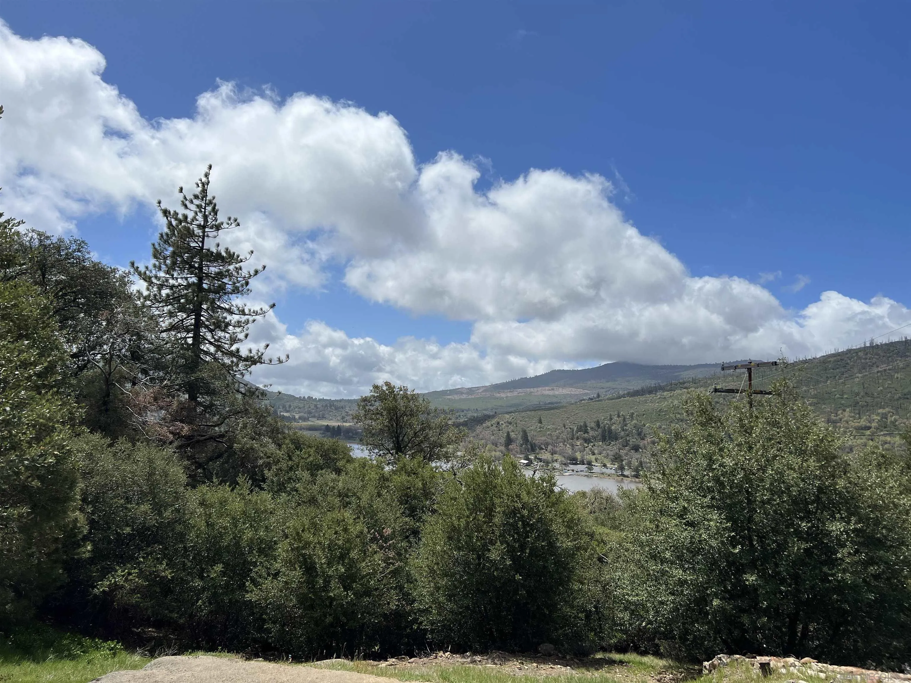 34739 Yuma Road Julian, CA 92036 - Photo 1 of 20 a view of a city with lush green forest