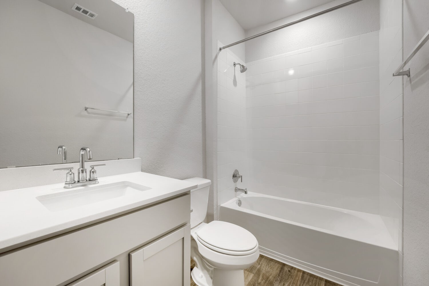 13507 Howser Trace Manor, TX 78653 - Photo 20 of 28 A well-appointed bath features a sleek vanity, modern fixtures, and a clean, functional tub-shower combination.