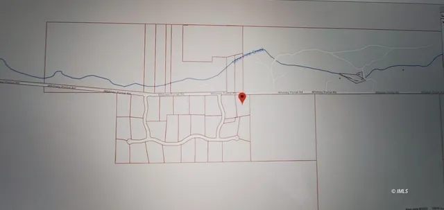 a view of a wooden floor and a mountain in the background