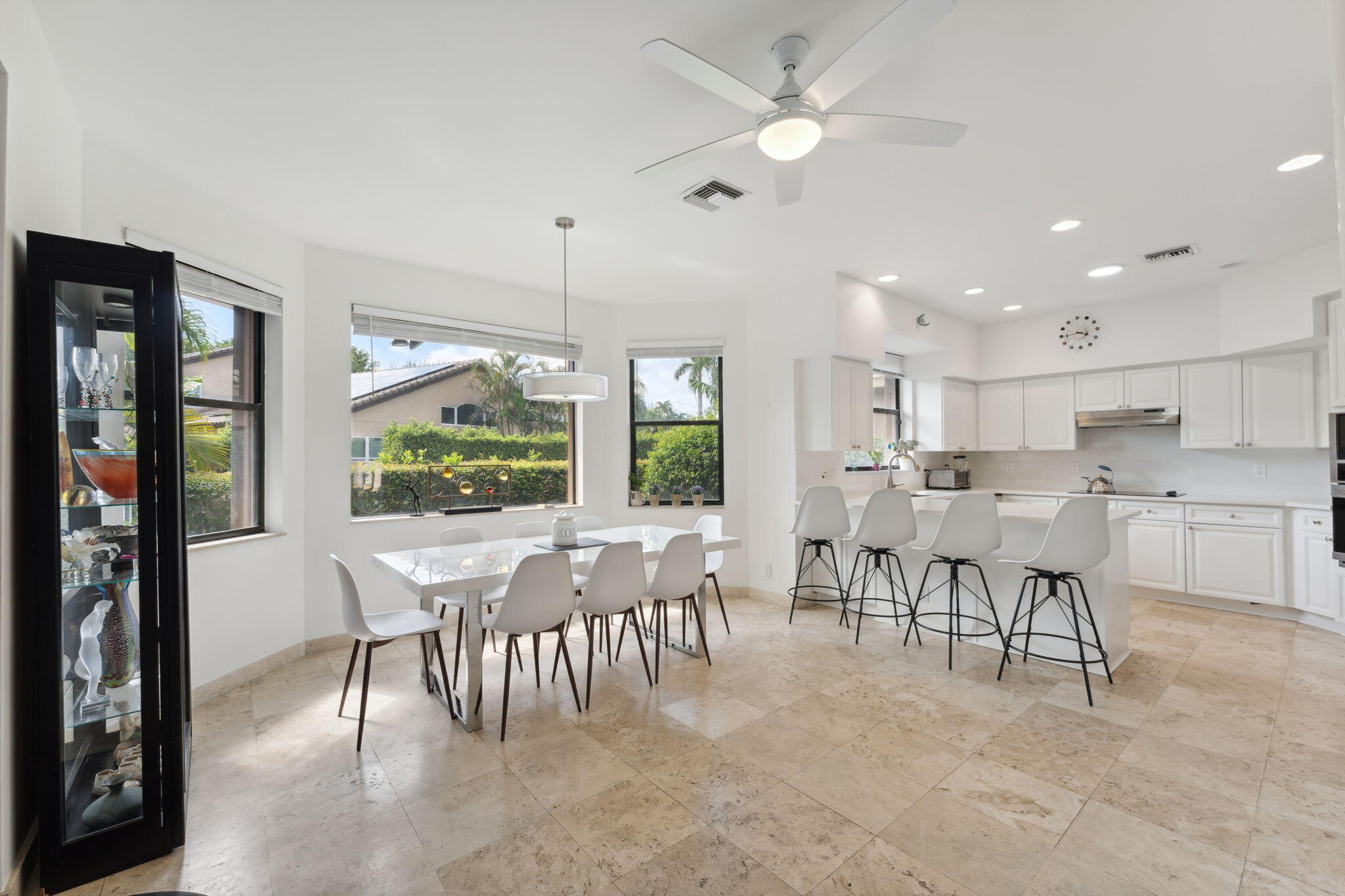 7726 La Corniche Circle Boca Raton, FL 33433 - Photo 3 of 27 a view of a dining room with furniture window and outside view