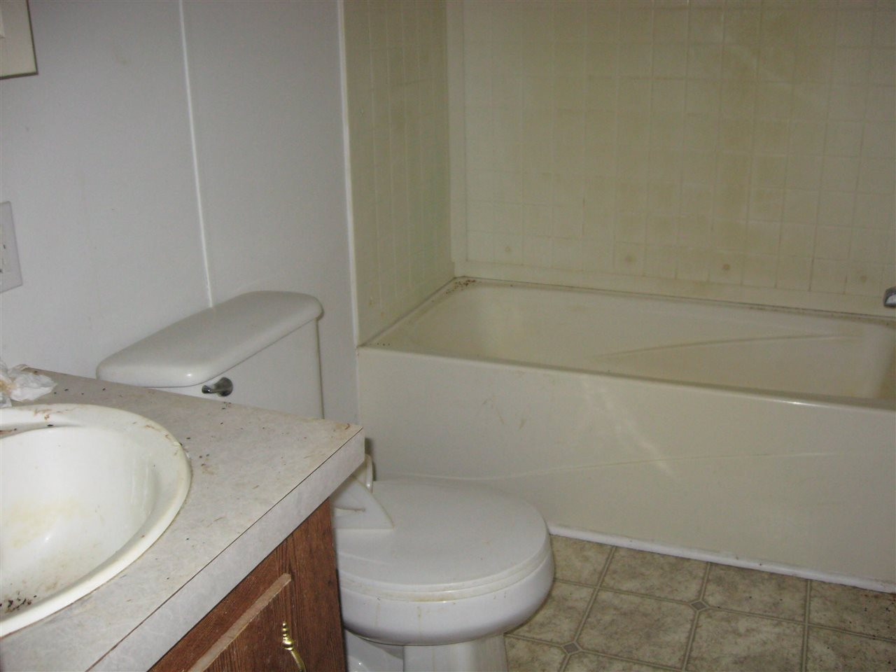 925 C Micro Road West Micro, NC 27555 - Photo 6 of 12 Bathroom in the hall between two bedrooms. Bathroom