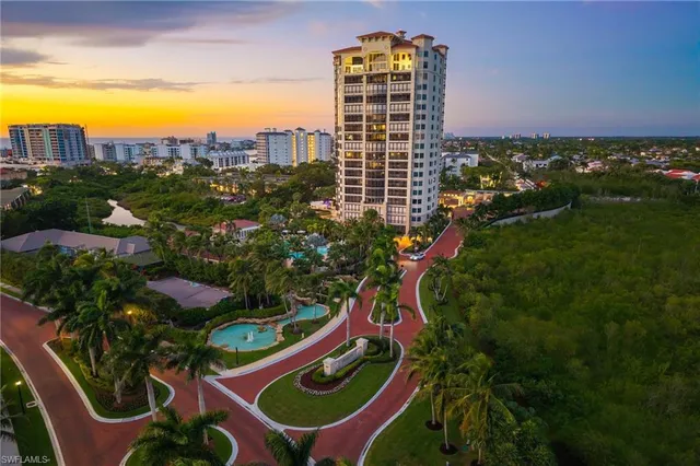 a view of a swimming pool with lounge chair