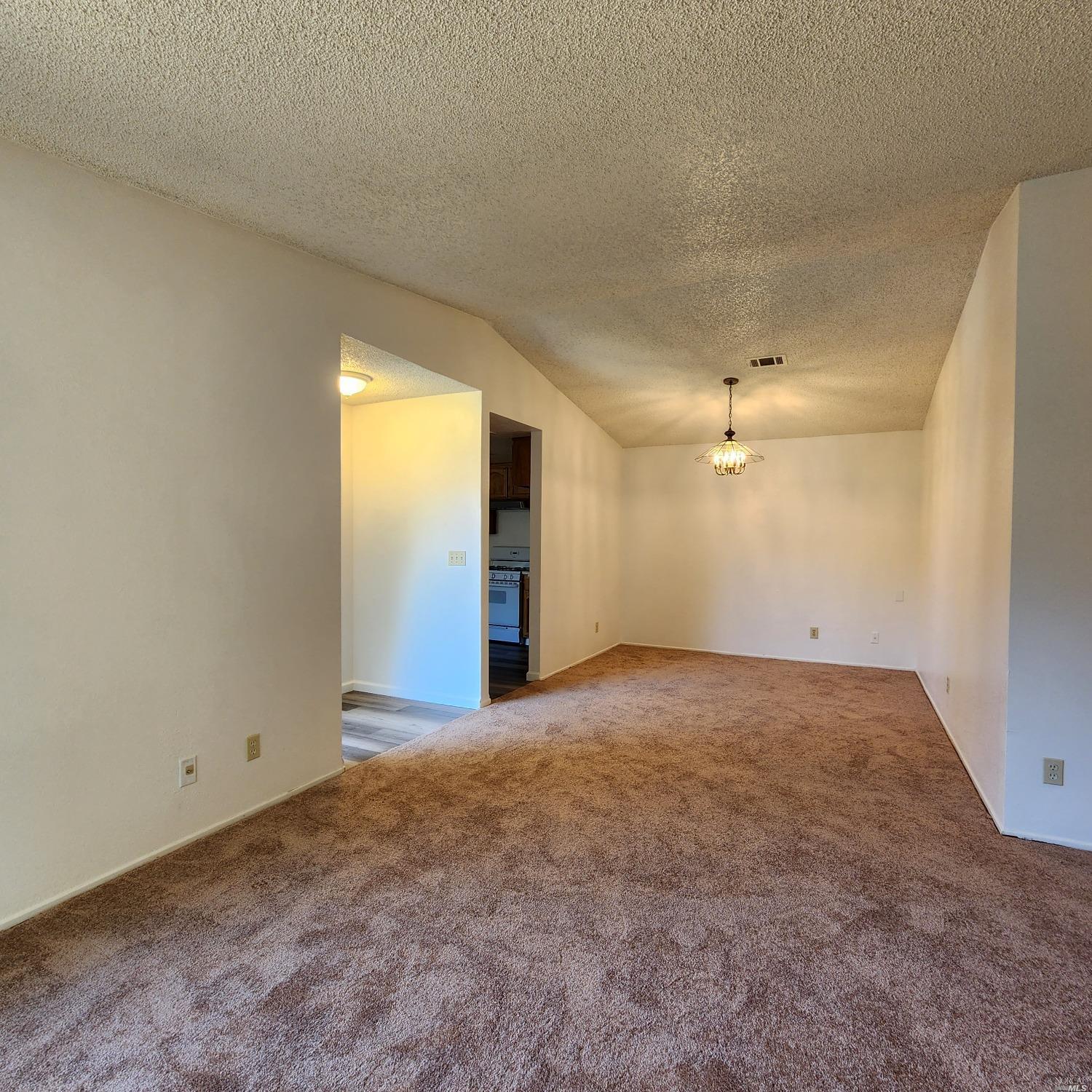 1024 Scott Street Fairfield, CA 94533 - Photo 3 of 9 an empty room with a empty space and windows