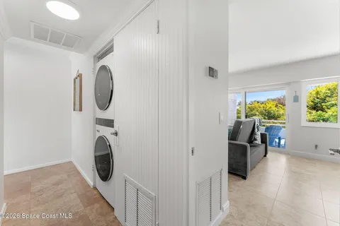 a view of utility room with windows