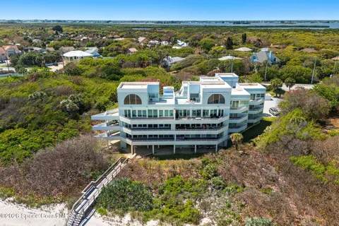 a view of a city with an ocean view