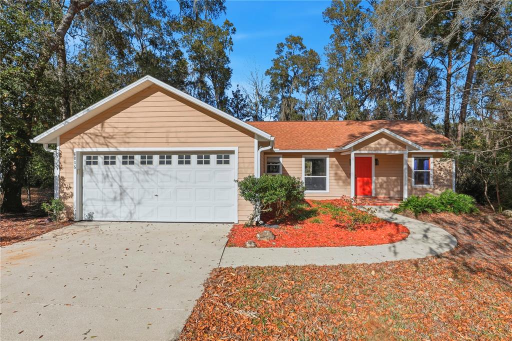 8006 Southwest 62 Lane Gainesville, FL 32608 - Photo 1 of 17 front view of a house with a yard