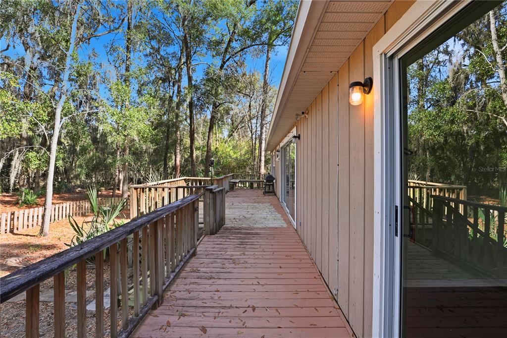 8006 Southwest 62 Lane Gainesville, FL 32608 - Photo 13 of 17 a view of a balcony with wooden floor