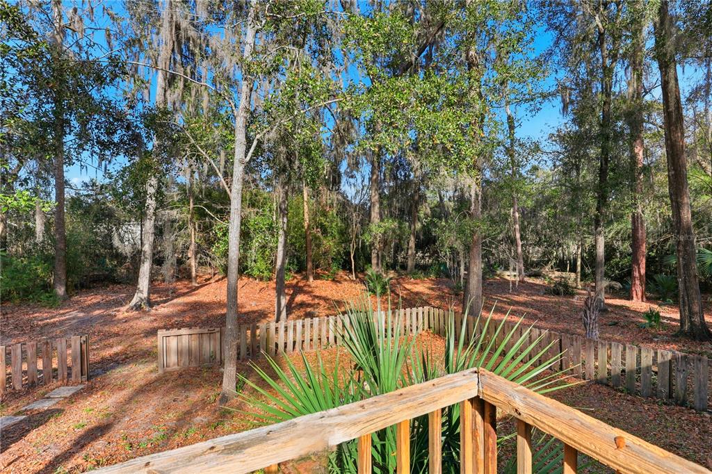 8006 Southwest 62 Lane Gainesville, FL 32608 - Photo 15 of 17 a view of a balcony with wooden floor