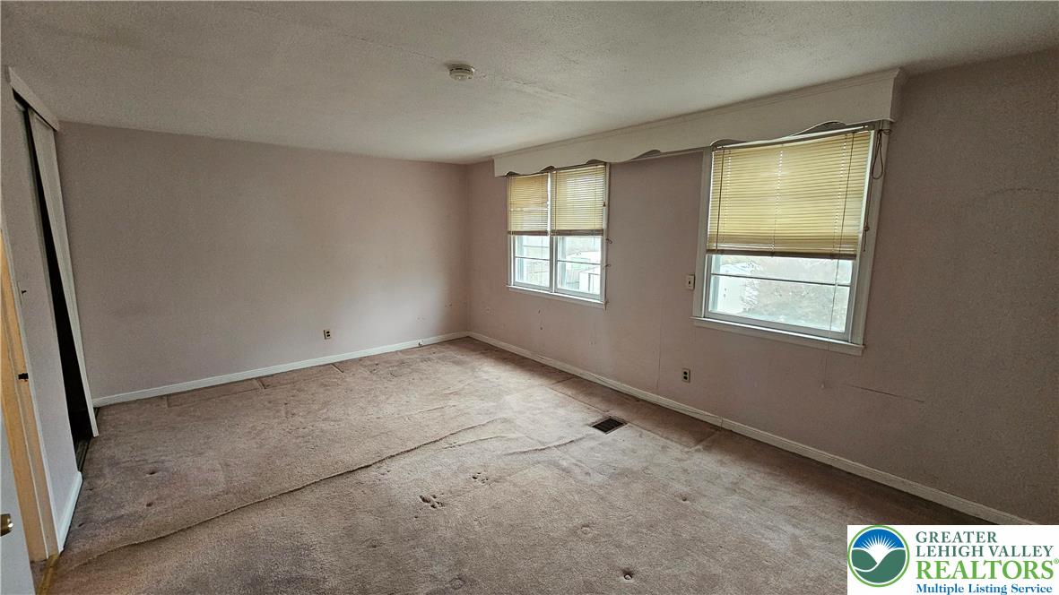 2335 4th Street Wilson, PA 18042 - Photo 24 of 48 an empty room with windows