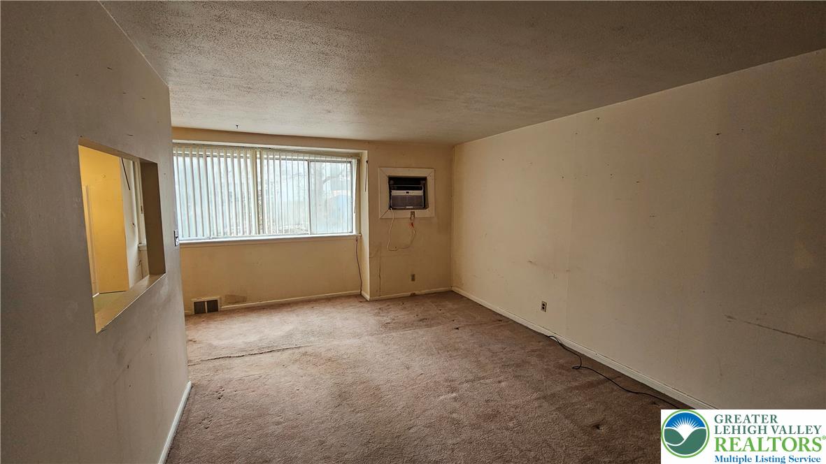 2335 4th Street Wilson, PA 18042 - Photo 10 of 48 a view of an empty room with a window