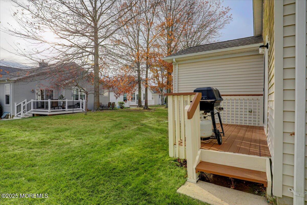 21 Shelley Road Brick, NJ 08724 - Photo 20 of 32 a view of a chairs in backyard of house