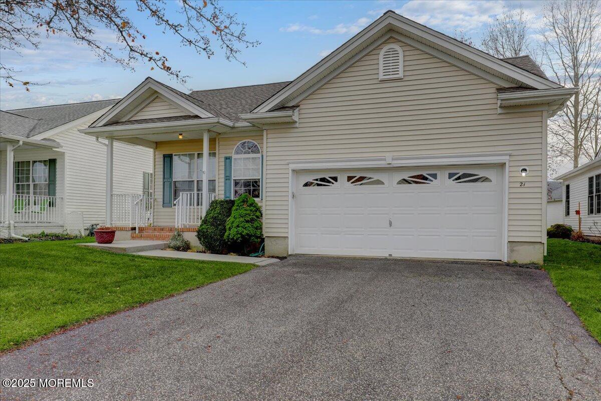 21 Shelley Road Brick, NJ 08724 - Photo 2 of 32 a view of a house with a yard and potted plants