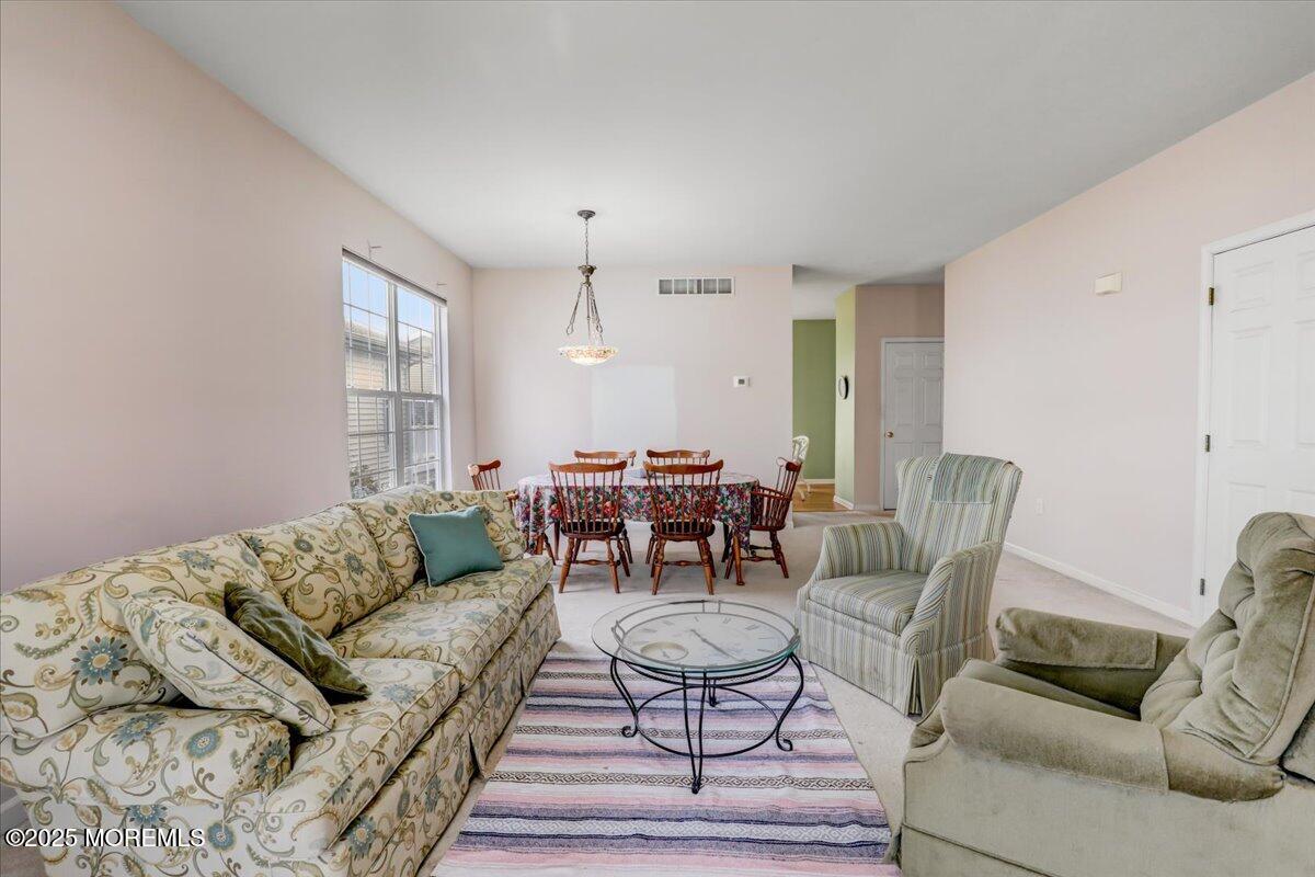 21 Shelley Road Brick, NJ 08724 - Photo 8 of 32 a living room with furniture and wooden floor
