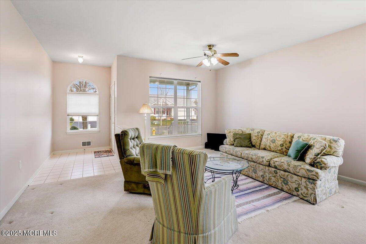 21 Shelley Road Brick, NJ 08724 - Photo 9 of 32 a living room with furniture a ceiling fan and a window