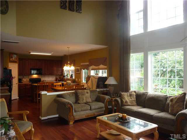 7624 Silver View Lane Raleigh, NC 27613 - Photo 25 of 25 a living room with furniture and a large window