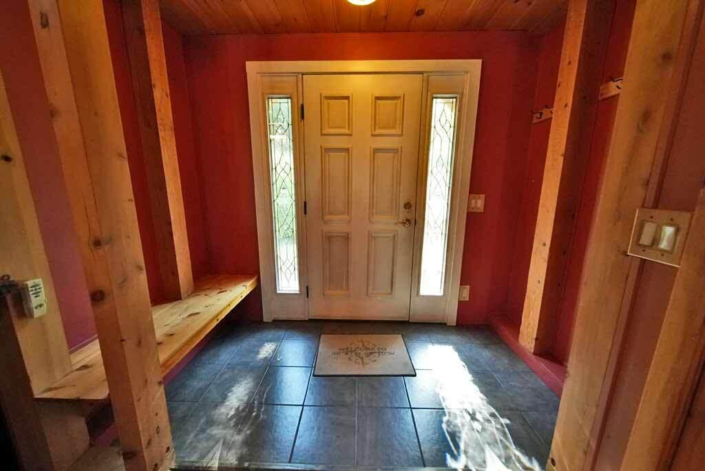 590 W Road Portage, ME 04768 - Photo 23 of 136 entry-foyer-me-lake-home
