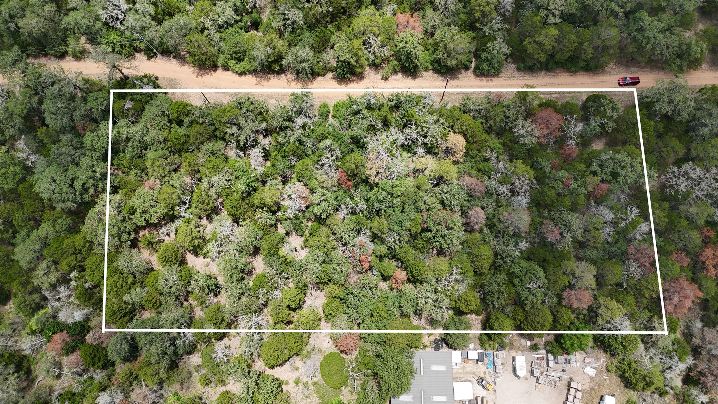 Tbd Red Fox Lane Bastrop, TX 78602 - Photo 5 of 14 A pristine wooded parcel, perfect for building your dream home, borders a private road.