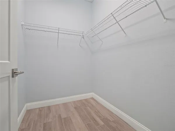 a view of a room with racks on the wall
