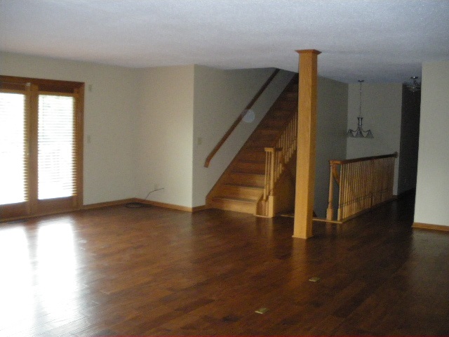 16480 Cannell Road Rockton, IL 61072 - Photo 3 of 24 a view of an entryway with wooden floor