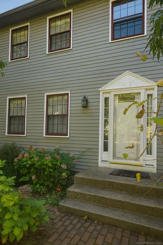 a view of a brick house with a window