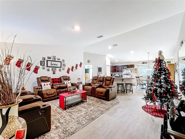 a living room with furniture window and a couch