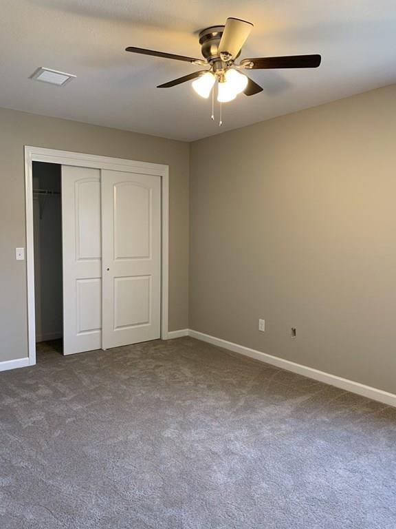55 Delaware Avenue Springfield, MA 01119 - Photo 17 of 20 an empty room with a ceiling fan and a window
