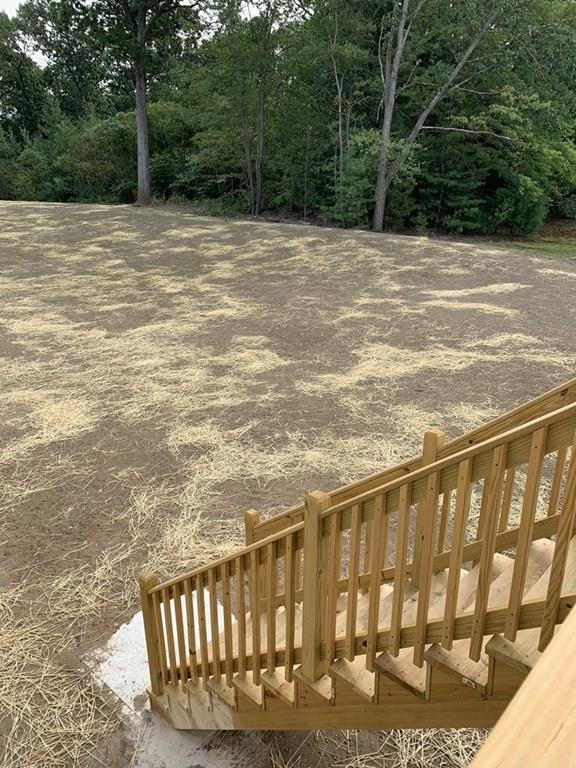 55 Delaware Avenue Springfield, MA 01119 - Photo 19 of 20 a view of outdoor space with deck and yard