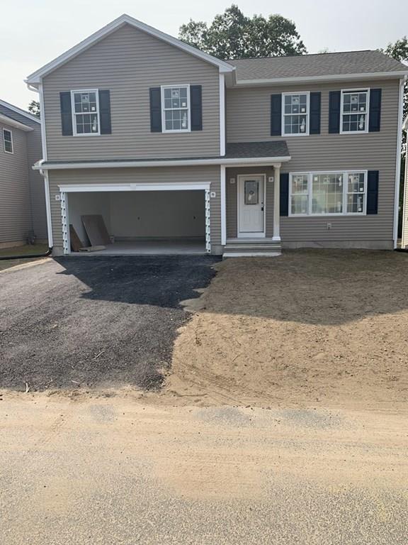 55 Delaware Avenue Springfield, MA 01119 - Photo 2 of 20 a front view of a house with a yard