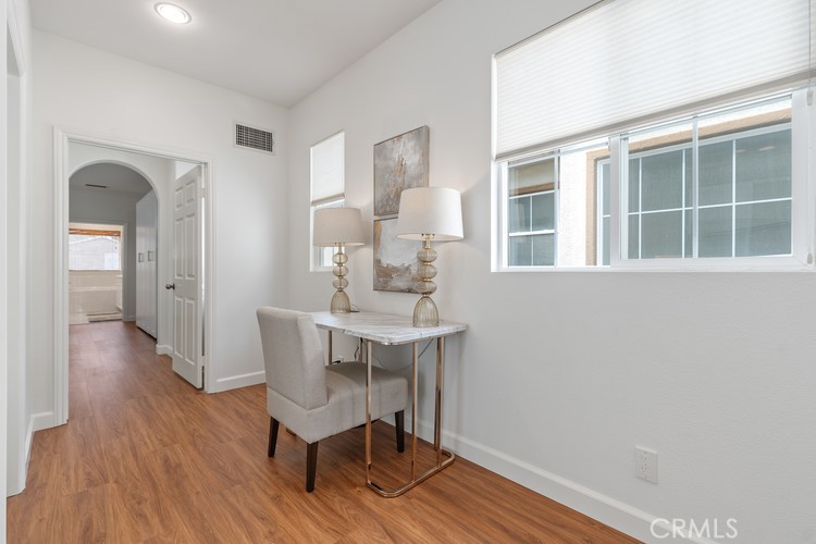 309 Flint Avenue Long Beach, CA 90814 - Photo 23 of 37 a view of a dining room with furniture window and wooden floor