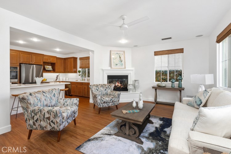 309 Flint Avenue Long Beach, CA 90814 - Photo 32 of 37 a living room with furniture fireplace and a window