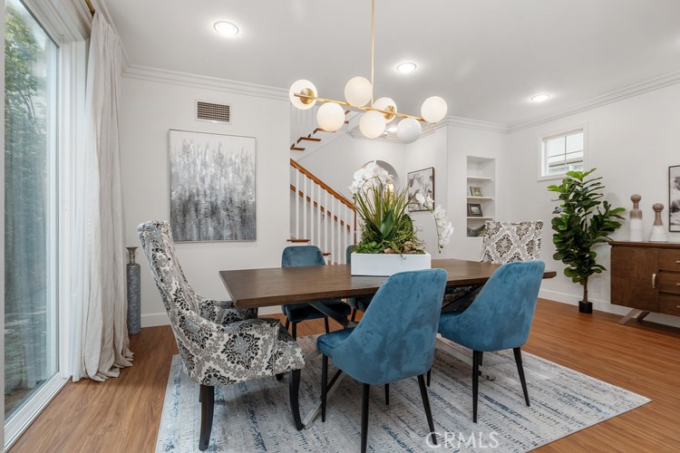 309 Flint Avenue Long Beach, CA 90814 - Photo 6 of 37 a view of a dining room with furniture and wooden floor