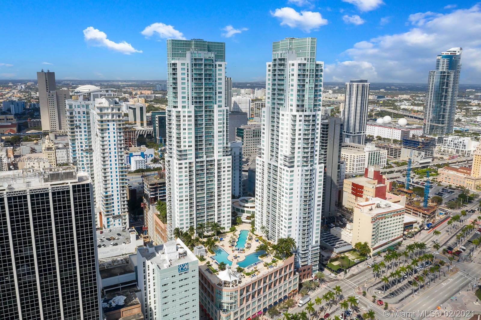 244 Biscayne Boulevard, Unit 3406 Miami, FL 33132 - Photo 14 of 20 a view of a balcony with couches