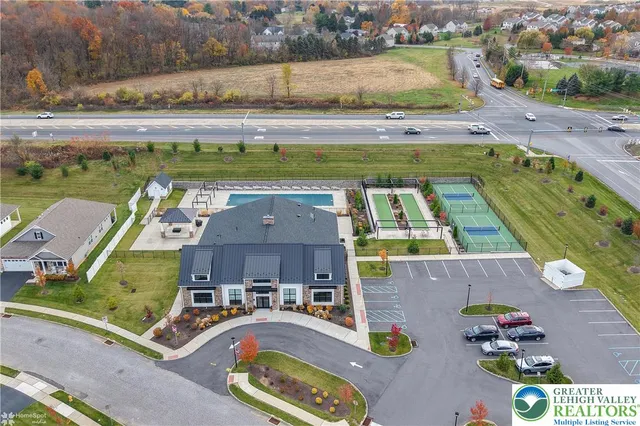 an aerial view of a house with a garden