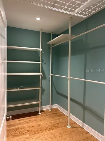 a view of a room with empty shelves